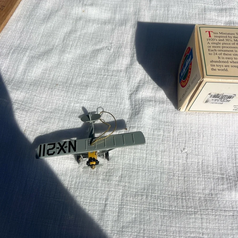Vintage Schylling Tin Toy Spirit of St. Louis Airplane Metal Christmas Ornament.